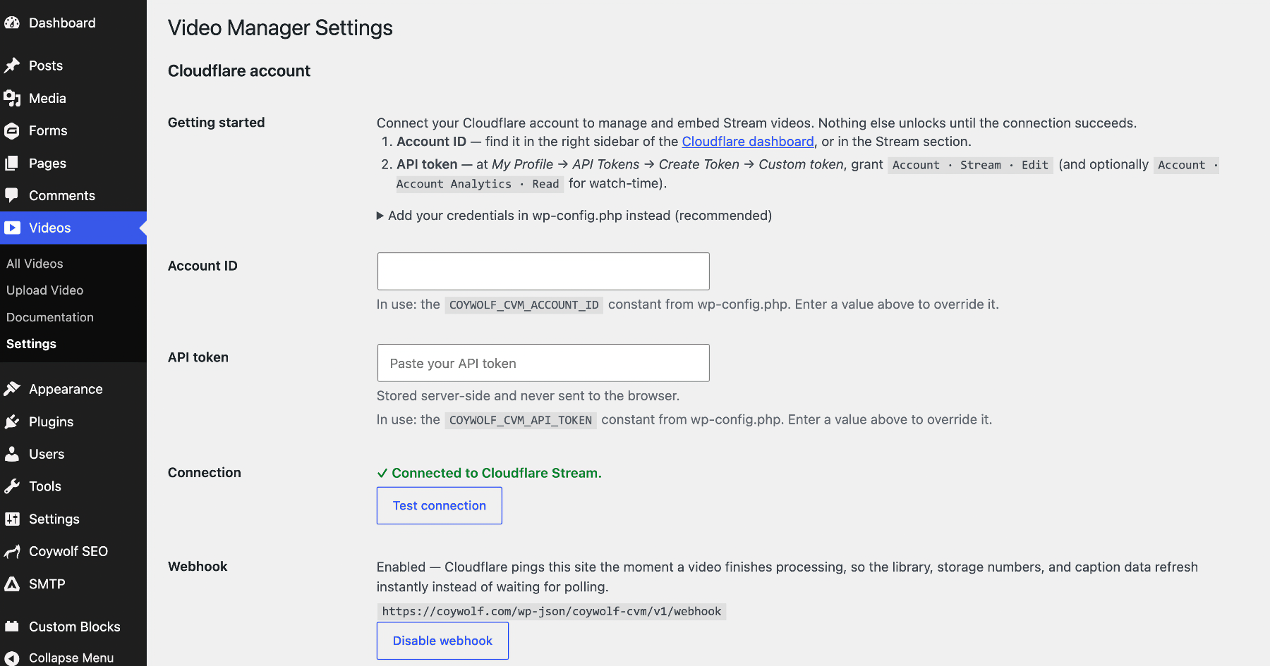 Connecting a Cloudflare account via Account ID and API token, with connection status and webhook controls.