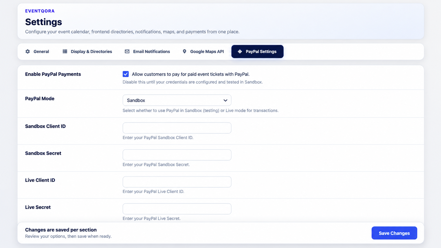 EventQora settings screen showing payment configuration options, including PayPal sandbox mode and credential fields.