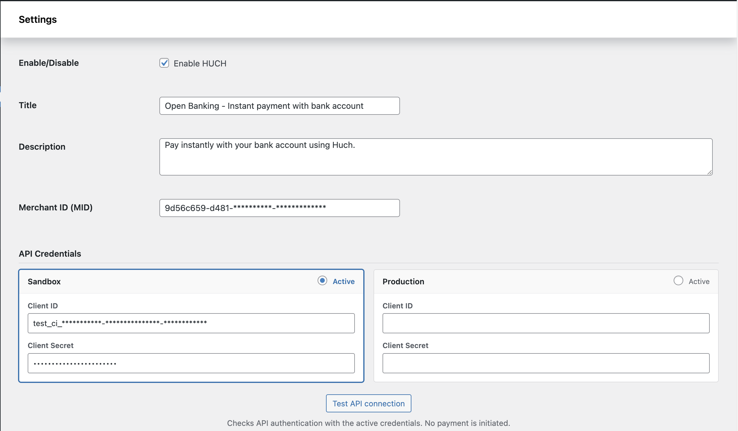 Payment gateway settings page — sandbox and production credential blocks with environment toggle.