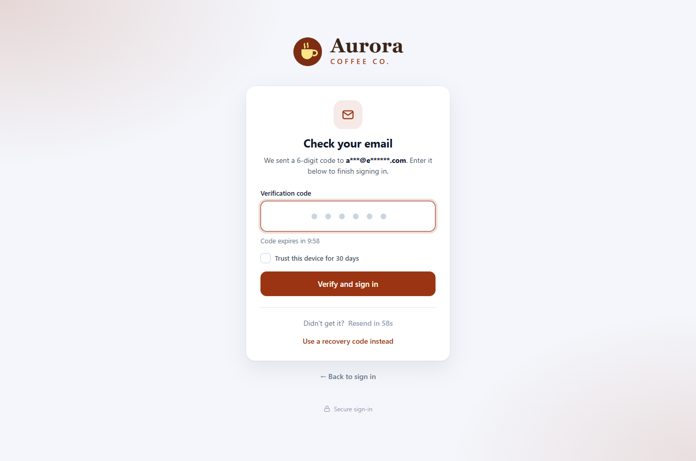 Friendly two-factor verification screen (email code shown; authenticator apps and passkeys are also supported).