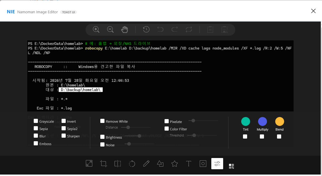 The "Edit Image" (🎨) button in the Image block toolbar.