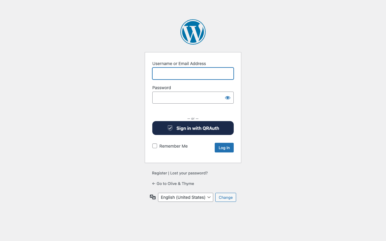 The WordPress login page with the "Sign in with QRAuth" button under the password form.