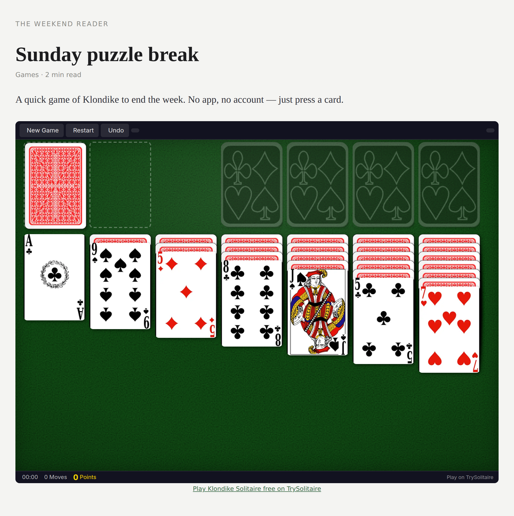 A Klondike game embedded in a post with the default theme. The credit line below the frame links to the game's page.
